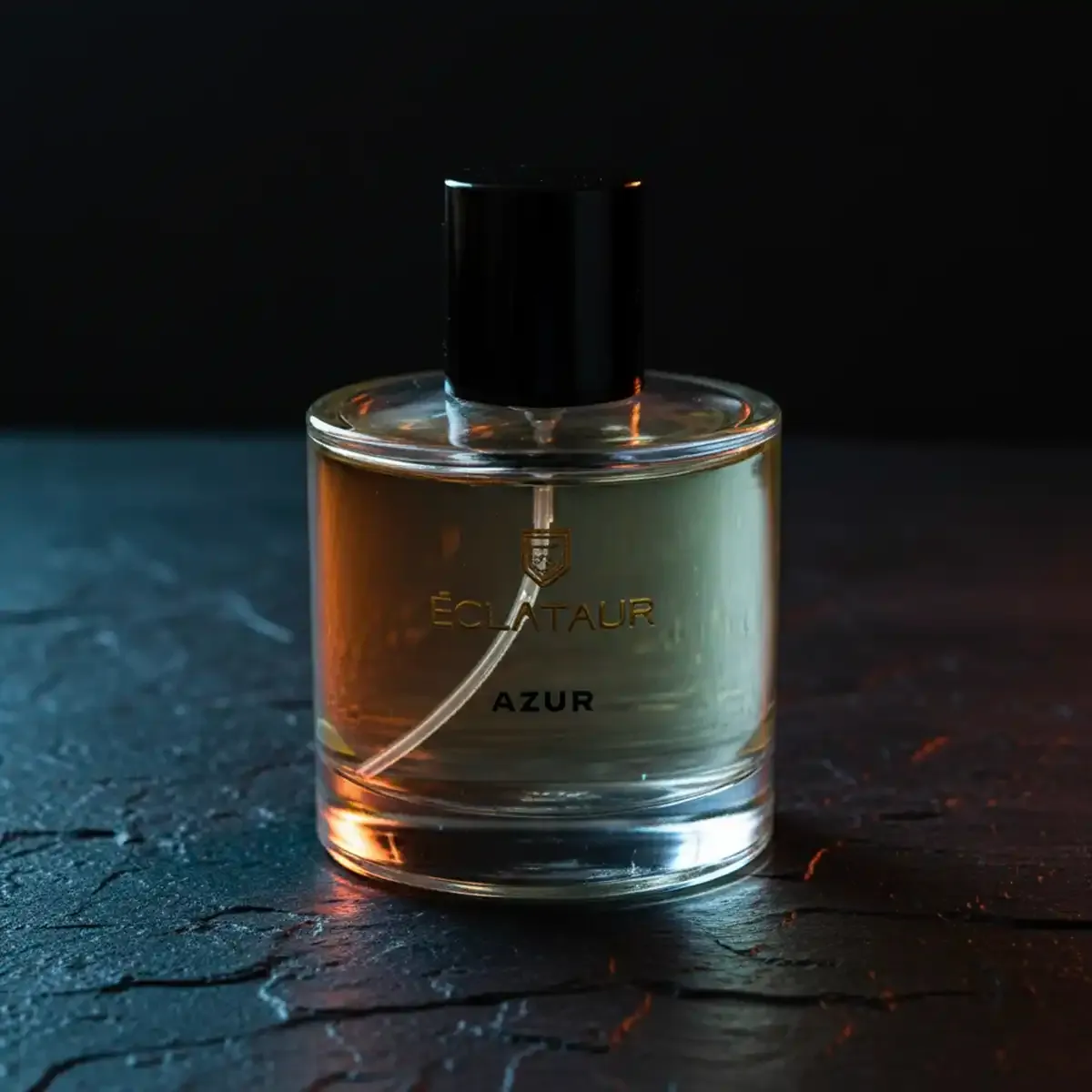 ÉCLATAUR AZUR perfume with cardamom bottle, matte black cap with gold detail